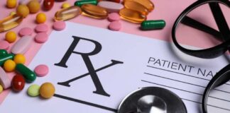 Prescription pad with various colorful pills and a stethoscope