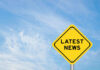 RECALL: Mislabelled Cookies, ER Visits? Yellow sign with text Latest News on sky background