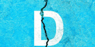 White letter D on cracked blue surface.