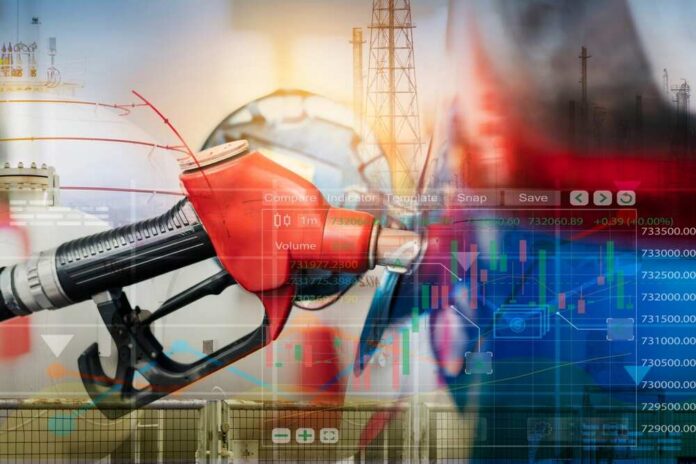 Car,Fueling,At,Gas,Station.,Refuel,Fill,Up,With,Petrol Gas pump with financial data overlay and oil refinery in the background