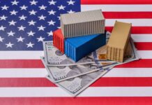 Mini shipping containers on US dollars over an American flag