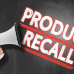 RECALL ALERT: Deadly Beads Lurk in THESE Popular Toys? Megaphone and Product Recall text on chalkboard.
