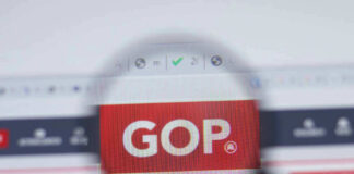 Magnifying glass highlighting GOP on a computer screen.