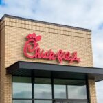 Chick-fil-A restaurant sign on a brick building