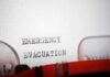 Close-up of a typewritten emergency evacuation notice