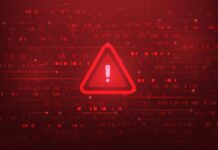 Warning triangle icon on red digital background