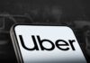 Sign showing Lyft and Uber pickup location.