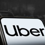 Sign showing Lyft and Uber pickup location.