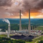 EPA TORCHES Carbon Limits – NEW DETAILS Coal-fired power plant with tall smokestacks at sunset