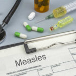 Silent Measles Aftershock Kills Teen Medical supplies including a stethoscope, syringes, and medication related to measles