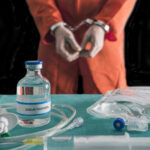 Hog Trail Killer Countdown Sparks Supreme Court Fight Handcuffed person in orange suit with lethal injection supplies.