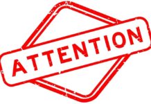 Red attention sign with the word 'ATTENTION' in bold letters