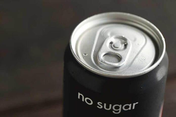 Close-up of a soda can with a no sugar label
