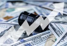 An oil barrel placed on a background of dollar bills with an upward trend graph overlay