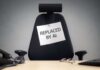 Empty office chair with a sign pinned to the backrest