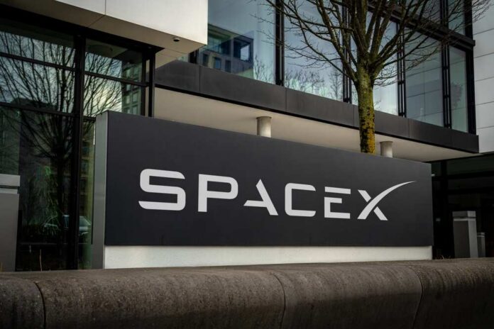 SpaceX sign outside a modern office building